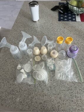 Breast Pump Parts and Baby Bottles - White, Yellow, Purple